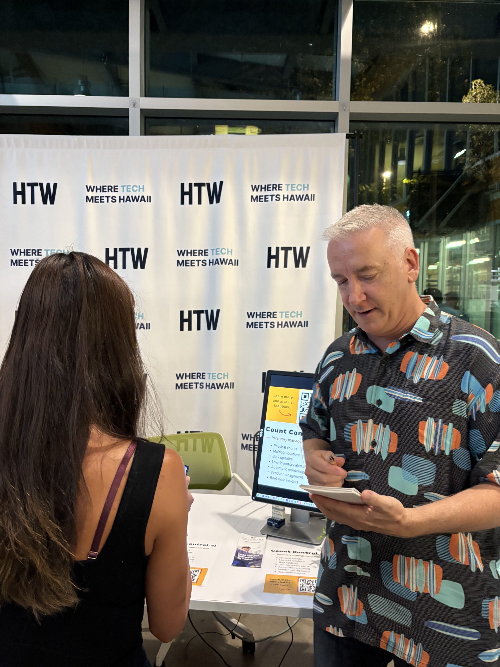 Brian with a Beta Brews participant testing the inventory management app offline mode