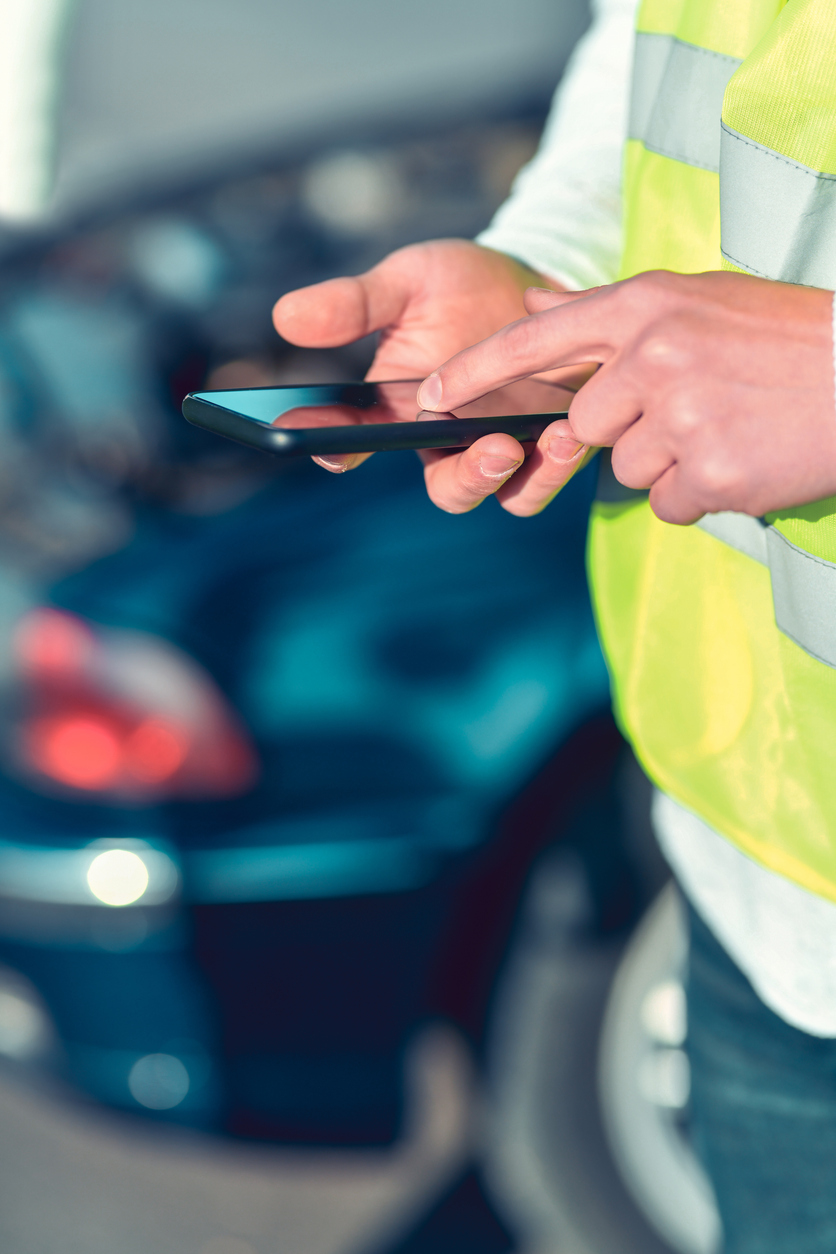 field service manager using fully custom software on an app on his phone.